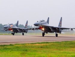 China sends large group of warplanes, navy ships toward Taiwan in forceful display