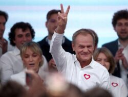 Polish opposition leader Tusk declares win after exit poll shows ruling conservatives lose majority